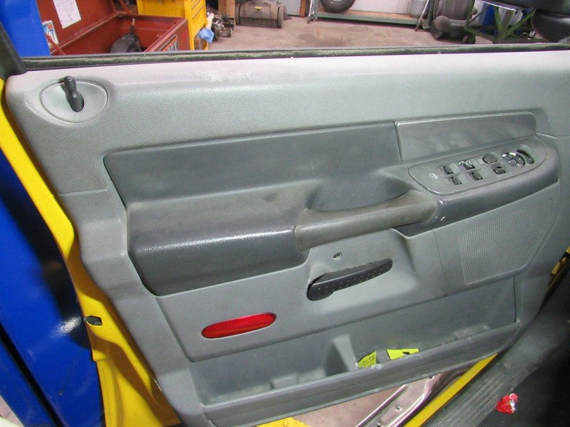 06-07 Ram 15/25/3500 Left LH Driver Side Front Door Trim Panel W/O Win