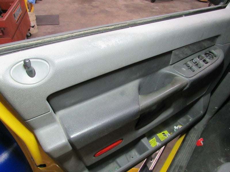 06-07 Ram 15/25/3500 Left LH Driver Side Front Door Trim Panel W/O Win