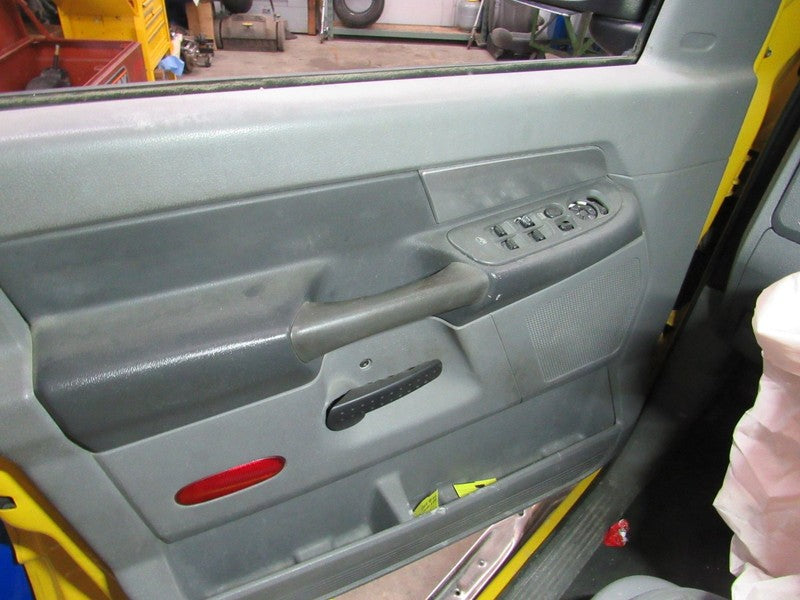 06-07 Ram 15/25/3500 Left LH Driver Side Front Door Trim Panel W/O Win