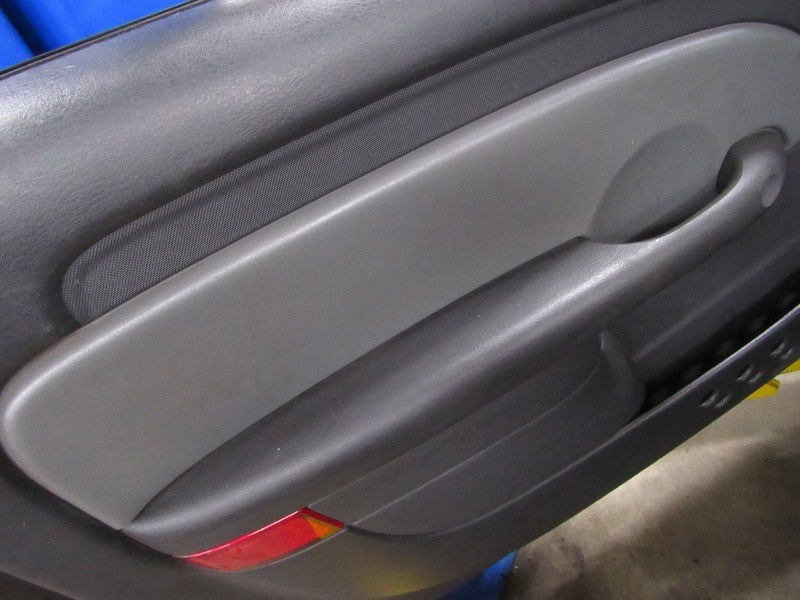 05 PT Cruiser Left LH Driver Side Front Door Trim Panel Black