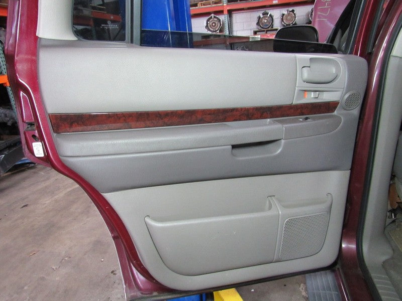 01-02 Dodge Durango Left LH Driver Side Rear Door Trim Panel Taupe
