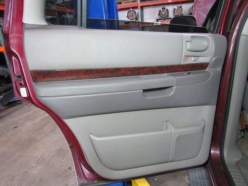 01-02 Dodge Durango Left LH Driver Side Rear Door Trim Panel Taupe