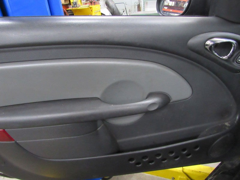 05 PT Cruiser Left LH Driver Side Front Door Trim Panel Black